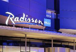  - ()       Radisson